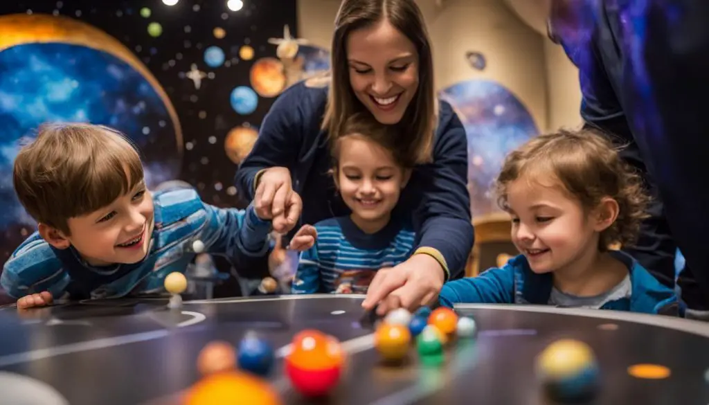 Family enjoying interactive exhibit at the Children's Museum of Fond du Lac